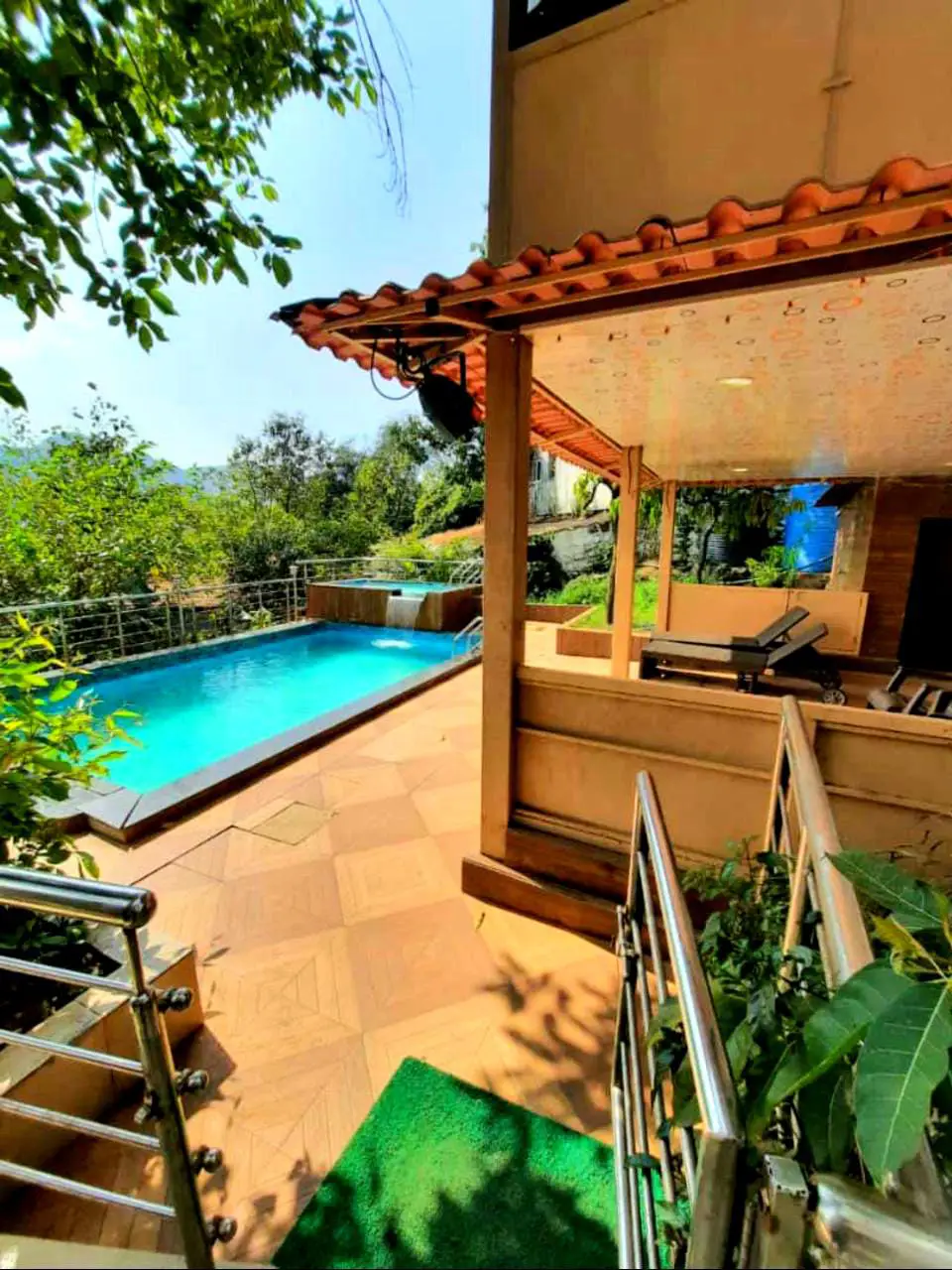 Villa for sale in Lonavala — exclusive 3 BHK pool villa exterior with waterfall